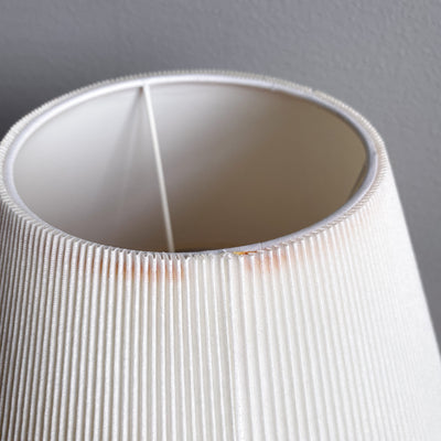 Bordslampa i glas med stenar