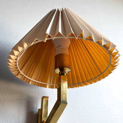 Vägglampa i mässing