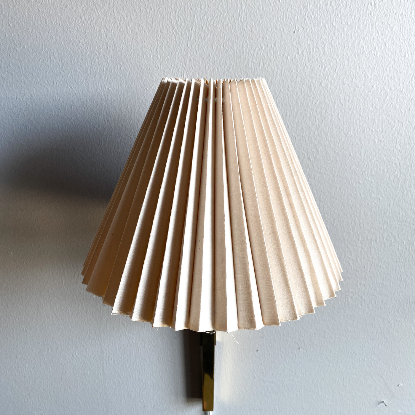 Vägglampa i mässing