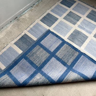 Rutig dubbelvävd ullmatta