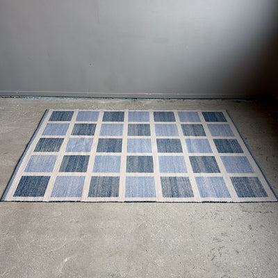 Rutig dubbelvävd ullmatta