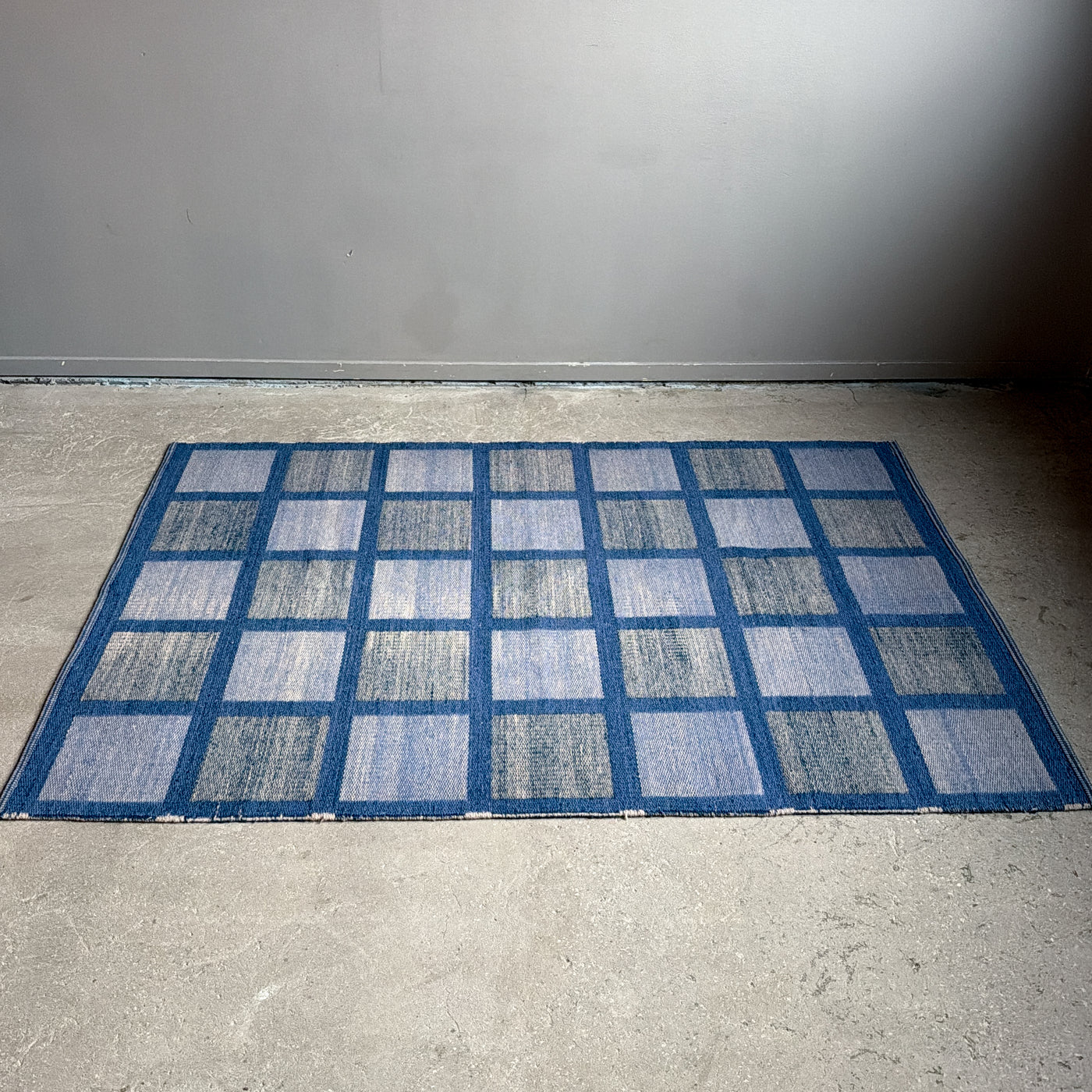 Rutig dubbelvävd ullmatta