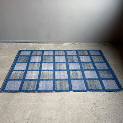 Rutig dubbelvävd ullmatta