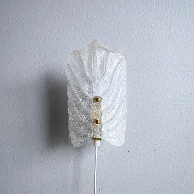 Vägglampa i glas och mässing