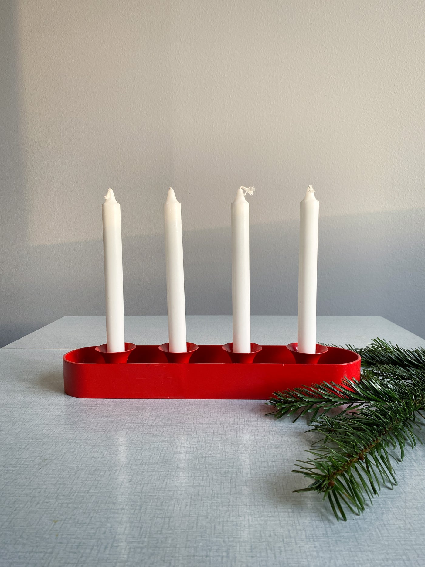 Röd adventsljusstake