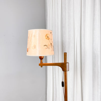 Golvlampa med arm