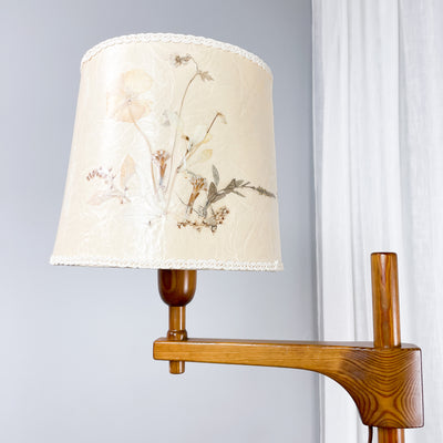 Golvlampa med arm