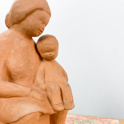 Figurin kvinna och barn