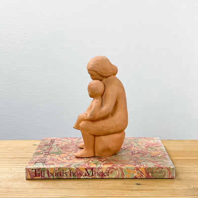 Figurin kvinna och barn